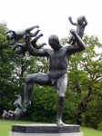 Just a Statue of a Man Fighting Babies