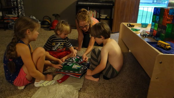 Max gets a new Quiet Book and demonstration