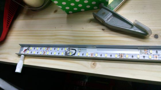 LED strip lighting - wire soldered in channel - drilled for barrel connector