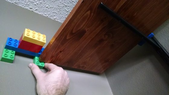 Space shelf with Duplo Lego before screwing to brackets 1